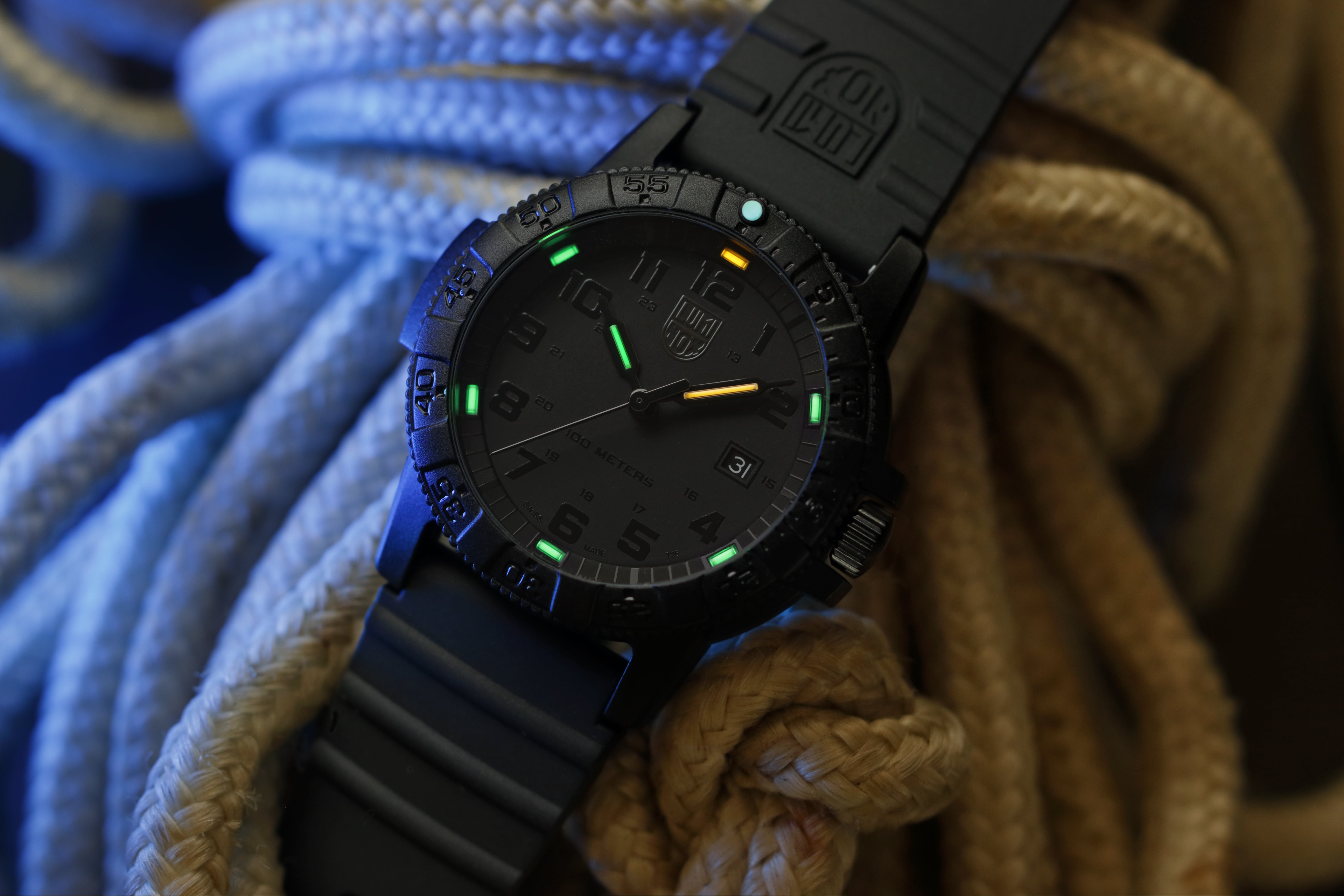 Close-up perspective of the Luminox Canada Leatherback Sea Turtle Giant 0321.BO.L Swiss Watch highlighting the texture and design. Swiss Made Constant Glow for up to 25 years in any light conditions 44 mm Diameter 100 Meters Water Resistance, 10 ATM, 330 Feet, Individually Tested Ronda 515, Swiss Quartz Movement 50 Months Battery Life Carbon Case, Fiberglass Compound with Crown Protection Uni-directional rotating Bezel with Super-LumiNova dot at 12h Hardened Mineral Crystal 12 mm Height Weigh 60g Replacemen