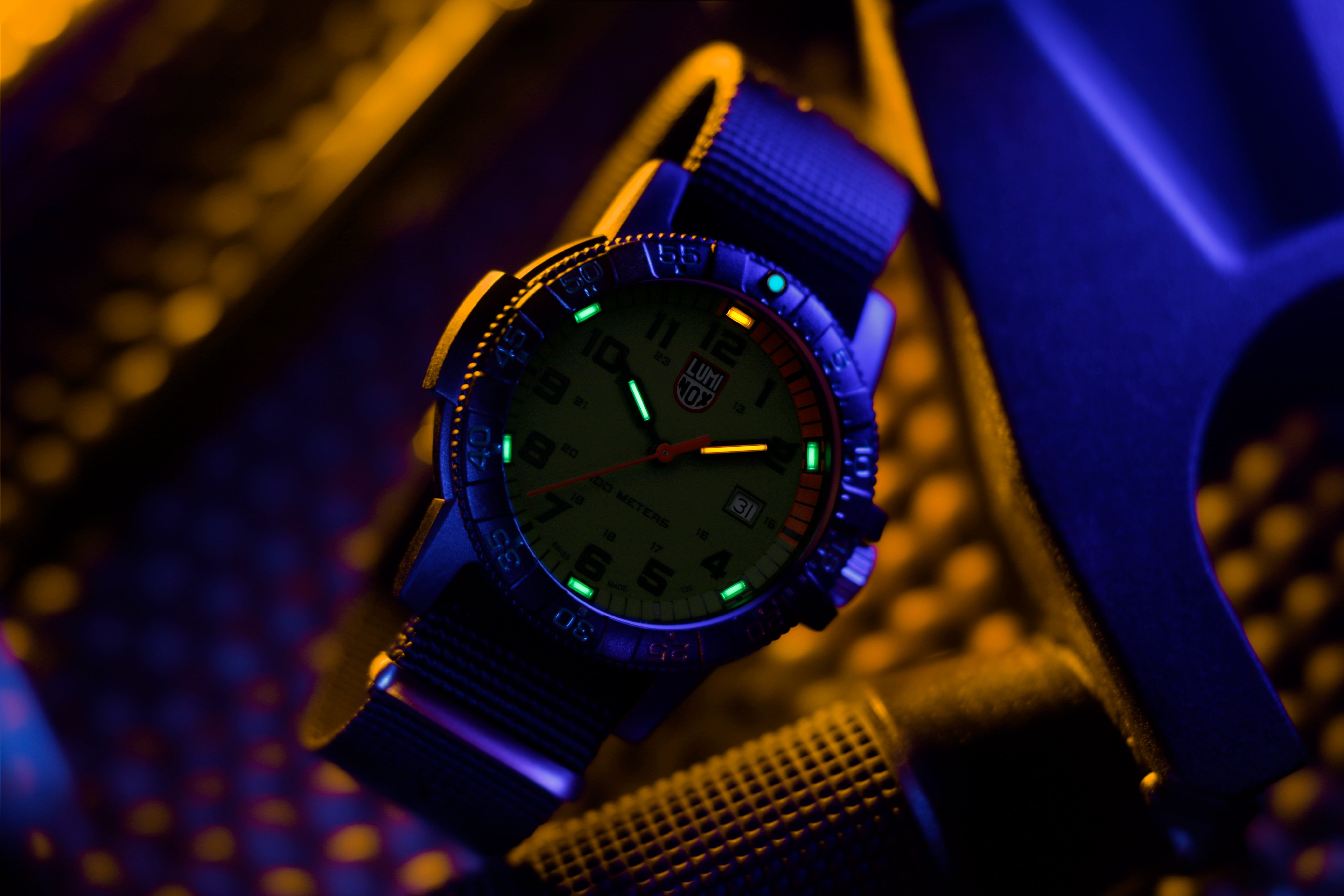 Close-up perspective of the Luminox Canada Leatherback Sea Turtle Giant 0337 Swiss Watch highlighting the texture and design. 44 mm Carbon Compound case and case back Carbon Compound unidirectional ratcheting bezel with Super-LumiNova at 12H Tempered scratch resistant mineral crystal Swiss quartz movement Water resistant to 100 meters Signature black PU strap with stainless steel signature buckle Luminox self-powered illumination on hands and at 2, 4, 6, 8, 10, 12H Swiss Made Replacement Strap FNX.2201.20