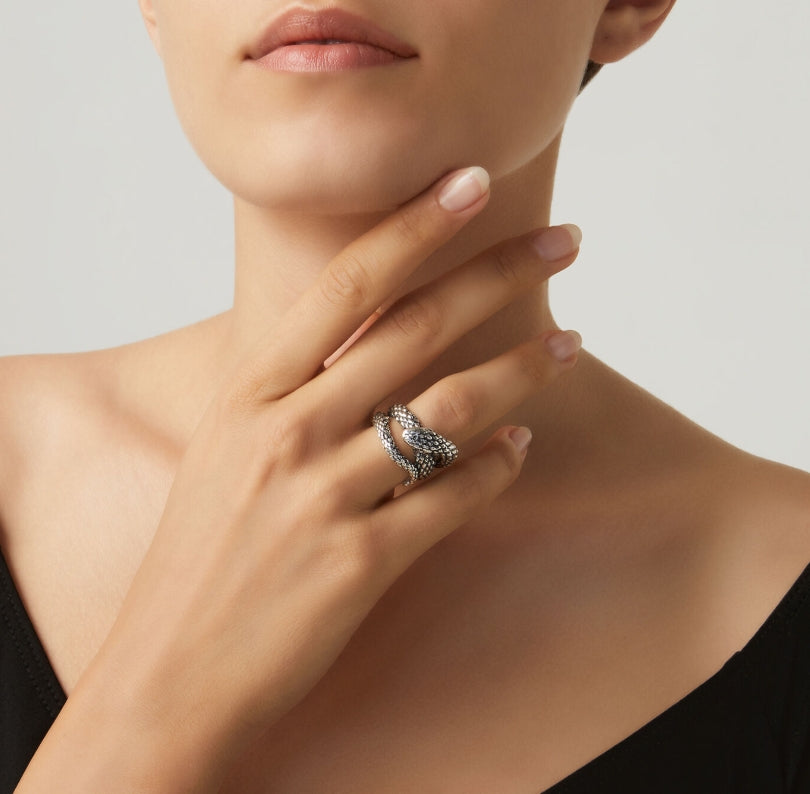 Detailed craftsmanship view of the Giovanni Raspini Snake Ring. This versatile piece wraps gracefully around your finger, perfect for everyday wear or special occasions.