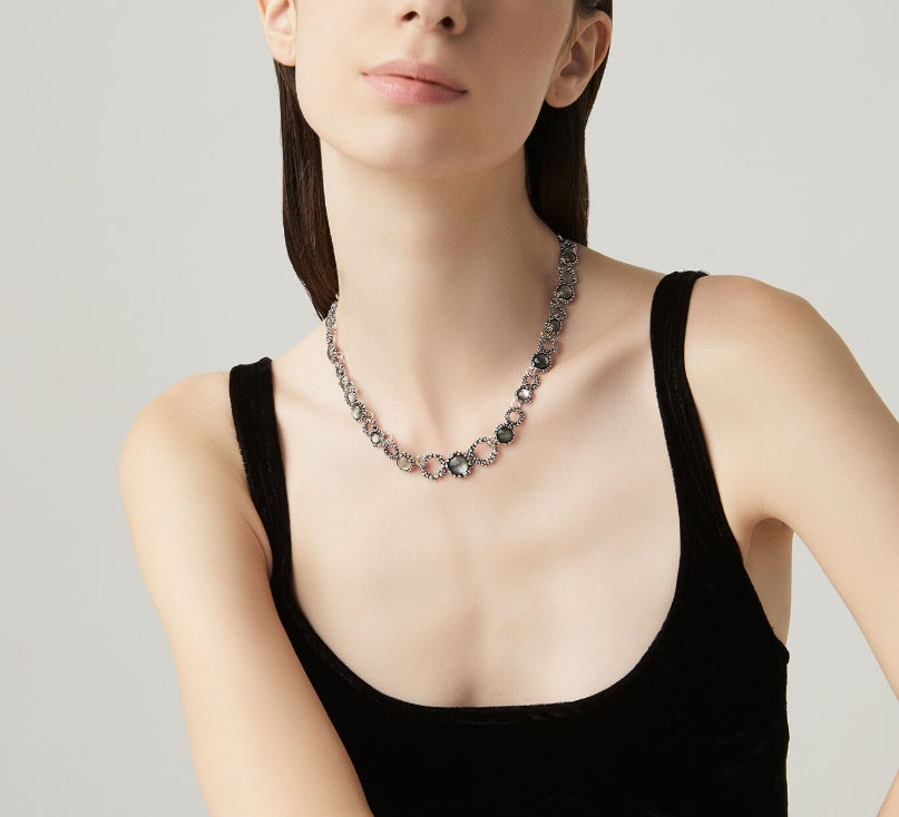 Detailed craftsmanship view of the Giovanni Raspini Maui Necklace. Each piece features genuine gemstones that catch the light, creating a sophisticated look perfect for everyday wear or special occasions.