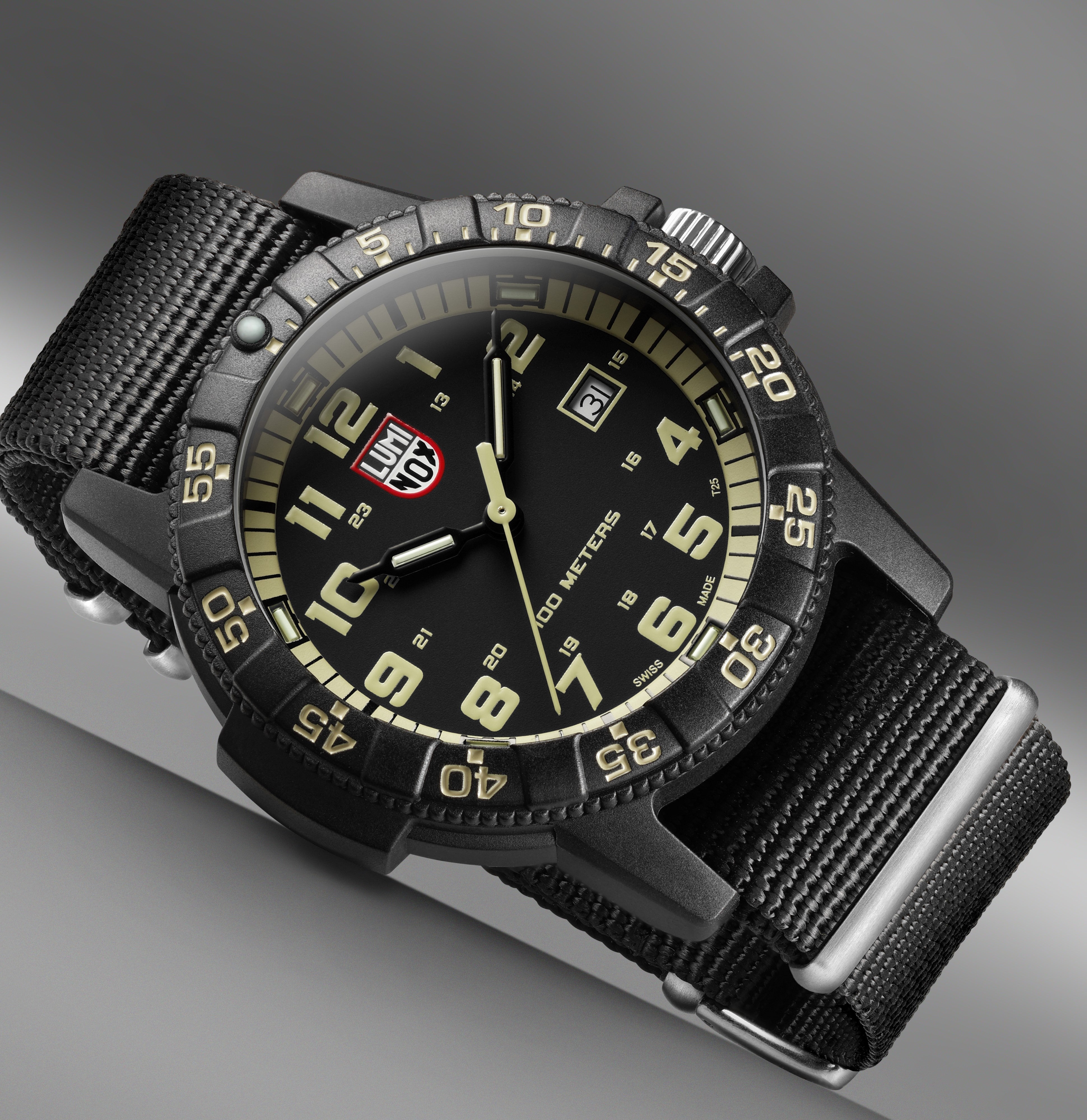 Alternate product view of the Luminox Canada Leatherback Sea Turtle Giant 0333 Swiss Watch. 44 mm Carbon Compound case and case back Carbon Compound unidirectional ratcheting bezel with Super-LumiNova at 12H Tempered scratch resistant mineral crystal Swiss quartz movement Water resistant to 100 meters Signature black Nylon strap with stainless steel signature buckle Luminox self-powered illumination on hands and at 2, 4, 6, 8, 10, 12H Swiss Made Replacement Strap FNX.2201.20Q.K Manual  GGM.L002.GMT 2 Ye