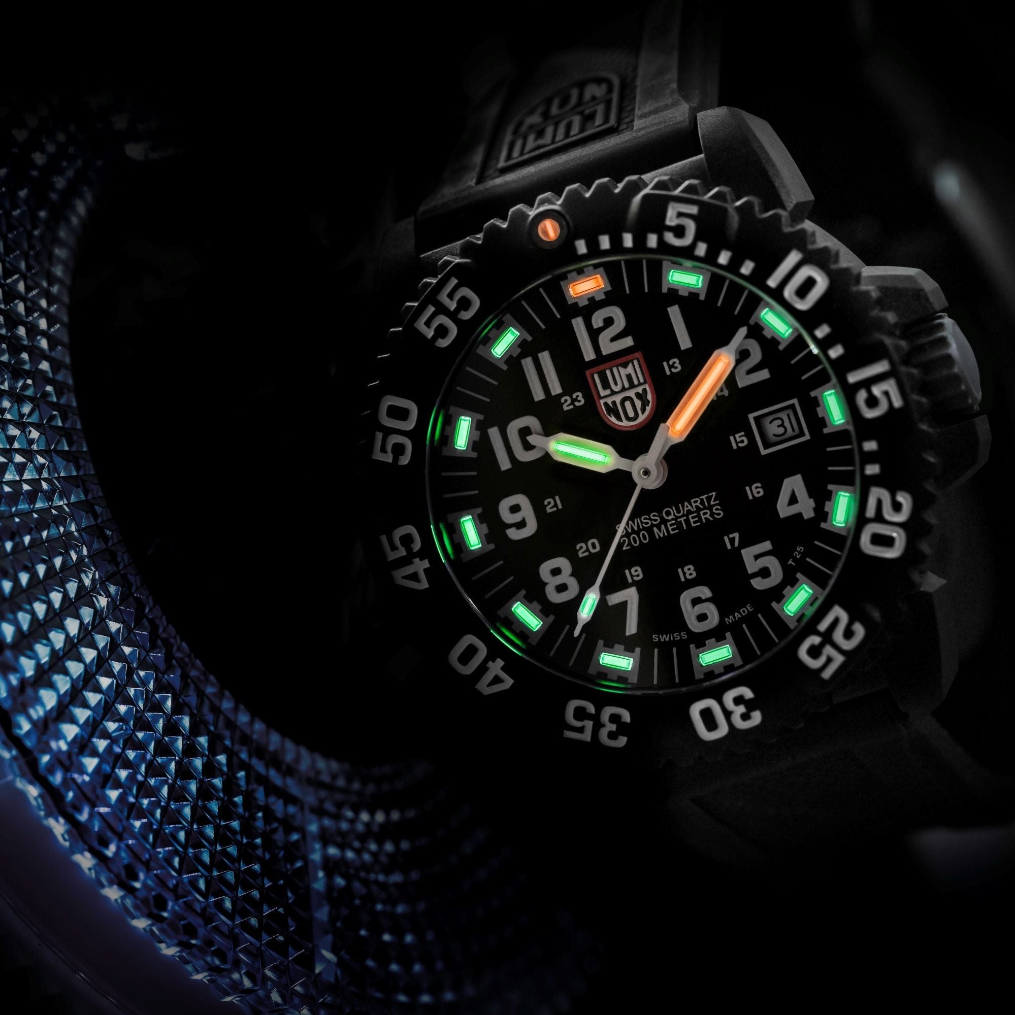 Lifestyle display layout for the Luminox Canada Navy SEAL Colormark XS.3051 Swiss Watch. The Luminox Navy SEAL Colormark 3050 Series is the best-selling timepiece in the Luminox SEAL collection, trusted and requested by elite forces worldwide.
