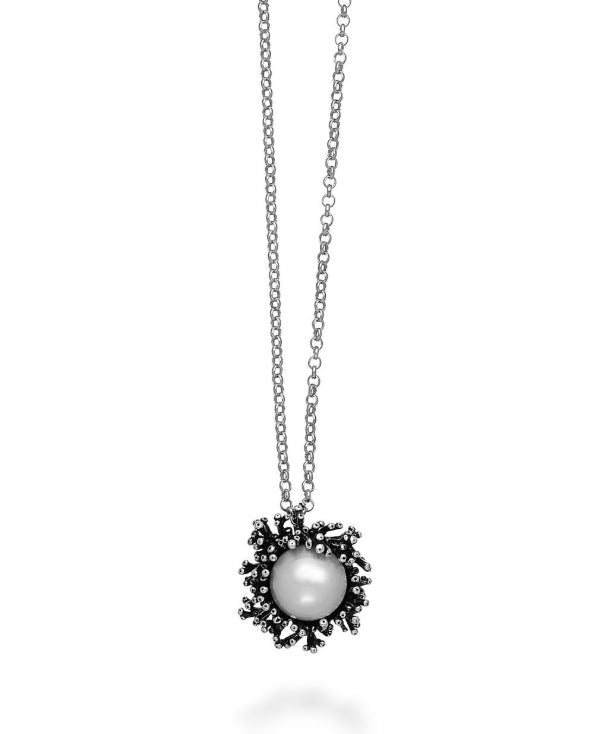 Discover the Giovanni Raspini Anemone Pendant Necklace. Elegant sterling silver necklace featuring a lustrous pearl pendant inspired by delicate anemone petals.